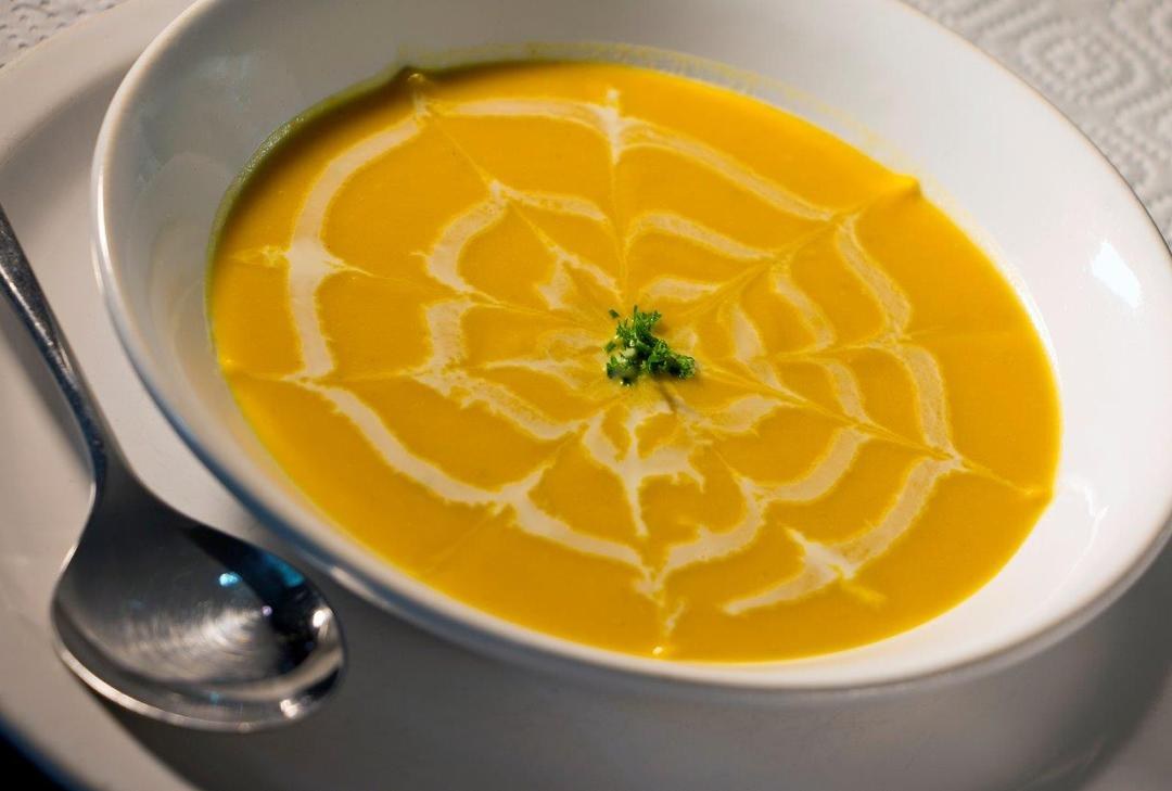 Creamy soup with a swirl of cream